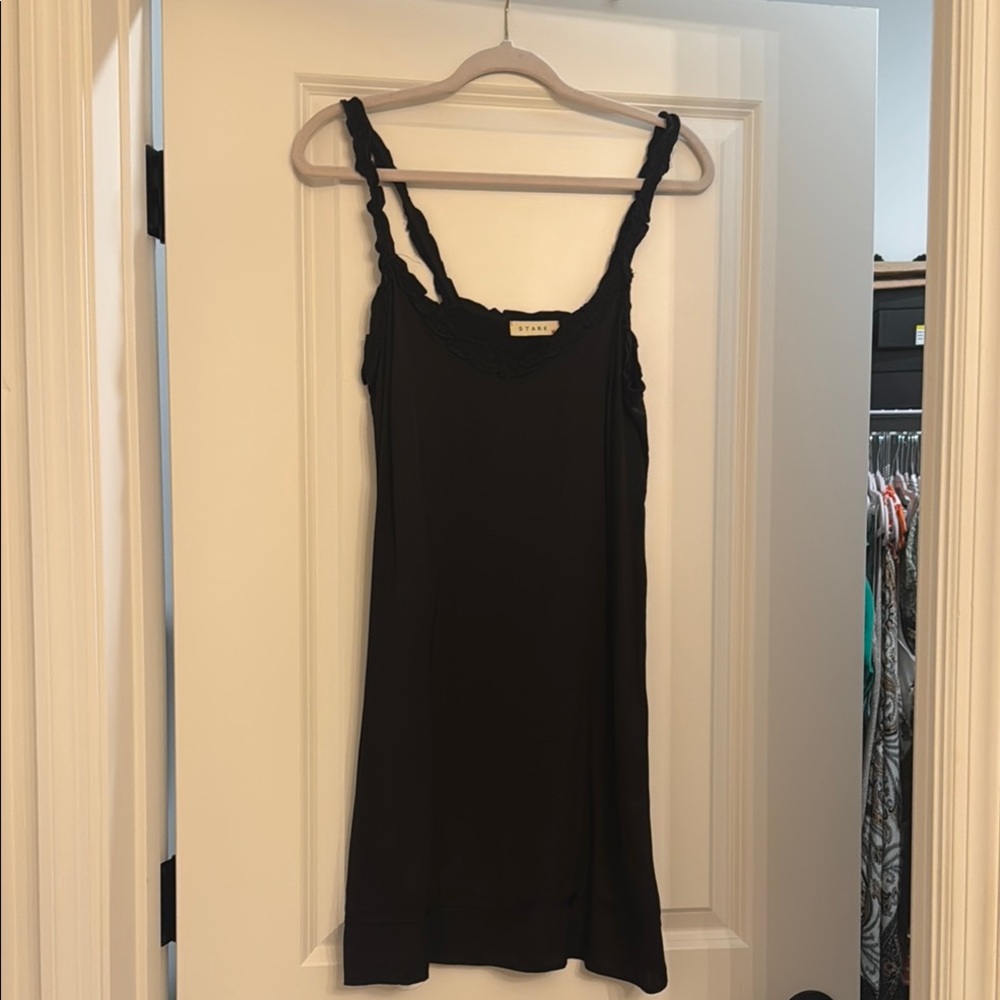 Theory Black Ribbed Spaghetti Strap Mini Dress
Silk texture